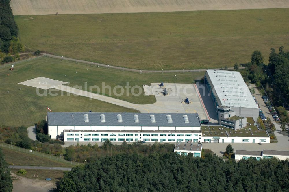 Aerial photograph Ahrensfelde - Blick auf das Areal der Bundespolizei-Fliegerstaffel Blumberg an der Neuer Schwanebecker Weg 3 in 16356 Ahrensfelde. Auf dem Gelände des Helikopterlandeplatzes am Berliner Stadtrand sind auch Maschinen der Regierungsfliegerstaffel stationiert. Am Standort erfolgt in den neu errichteten Hangars auch die Wartung und Reparatur der Flugtechnik.