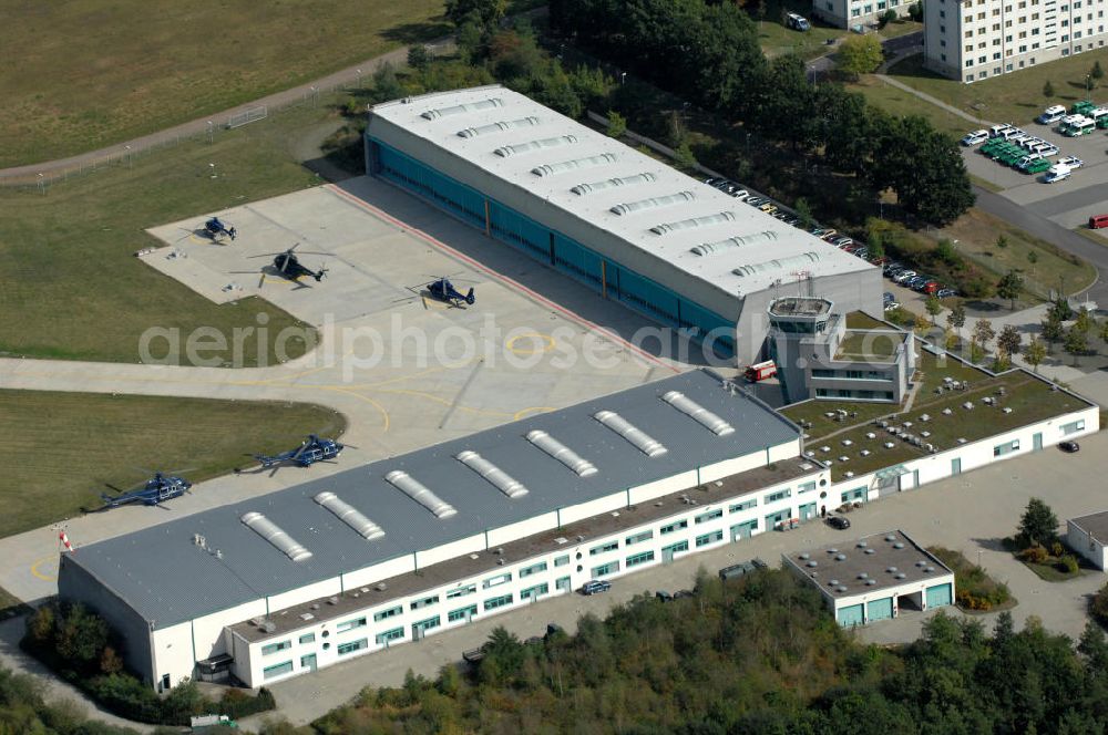 Ahrensfelde from above - Blick auf das Areal der Bundespolizei-Fliegerstaffel Blumberg an der Neuer Schwanebecker Weg 3 in 16356 Ahrensfelde. Auf dem Gelände des Helikopterlandeplatzes am Berliner Stadtrand sind auch Maschinen der Regierungsfliegerstaffel stationiert. Am Standort erfolgt in den neu errichteten Hangars auch die Wartung und Reparatur der Flugtechnik.