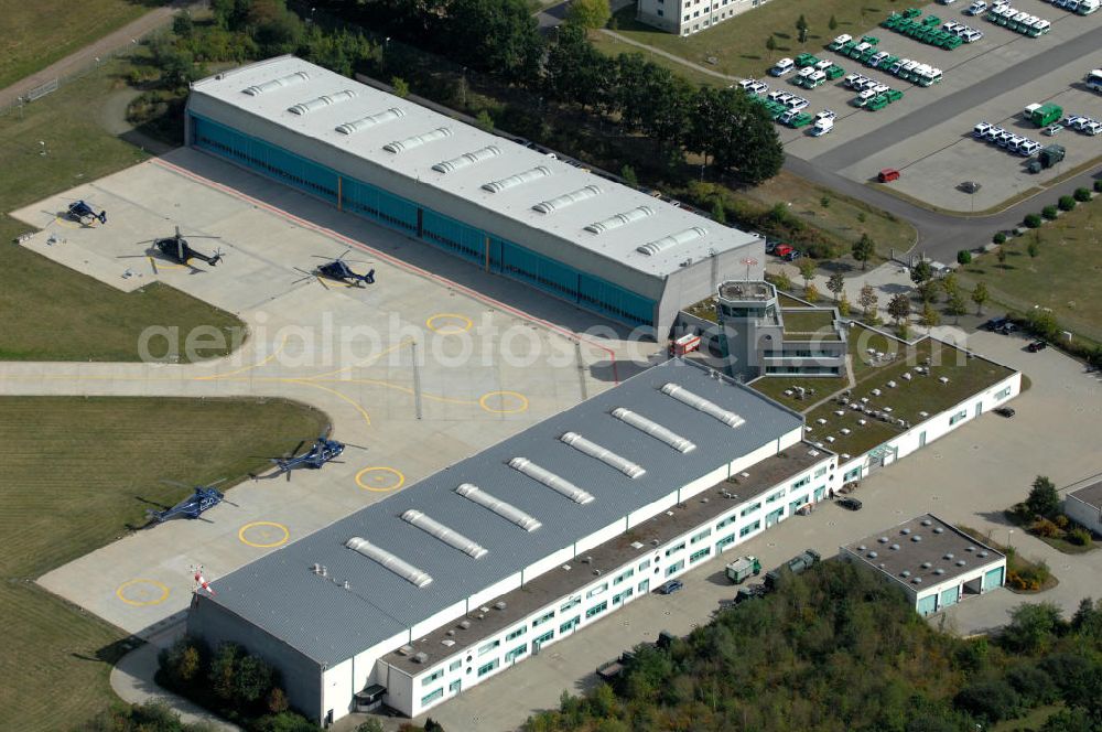 Ahrensfelde from above - Blick auf das Areal der Bundespolizei-Fliegerstaffel Blumberg an der Neuer Schwanebecker Weg 3 in 16356 Ahrensfelde. Auf dem Gelände des Helikopterlandeplatzes am Berliner Stadtrand sind auch Maschinen der Regierungsfliegerstaffel stationiert. Am Standort erfolgt in den neu errichteten Hangars auch die Wartung und Reparatur der Flugtechnik.