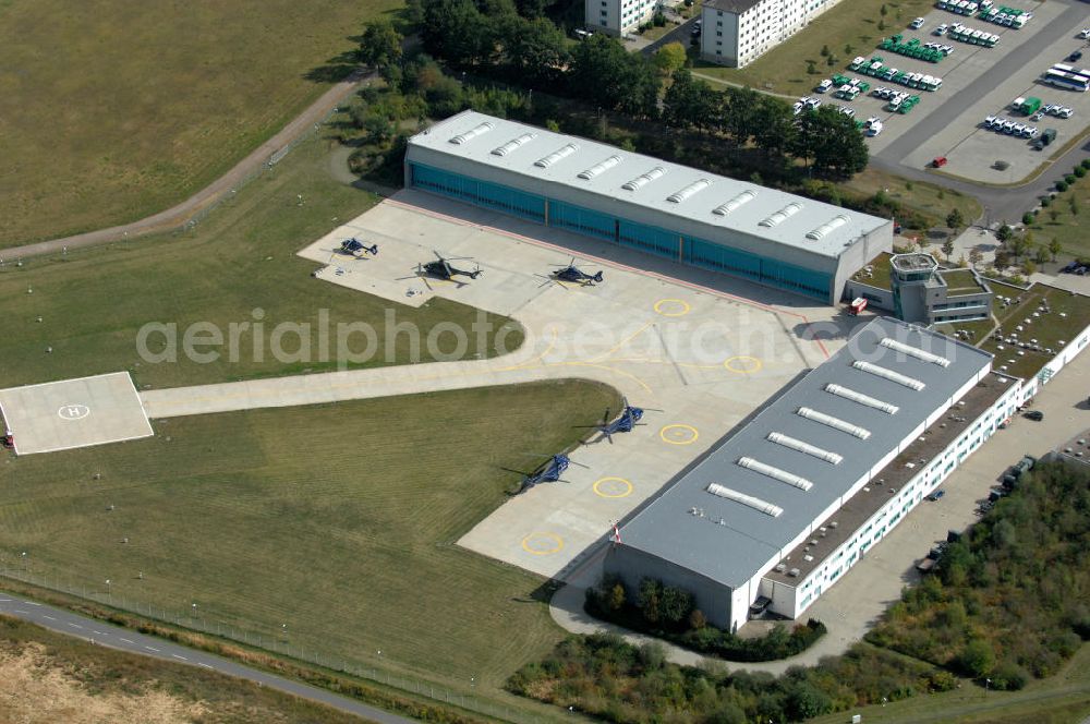 Aerial image Ahrensfelde - Blick auf das Areal der Bundespolizei-Fliegerstaffel Blumberg an der Neuer Schwanebecker Weg 3 in 16356 Ahrensfelde. Auf dem Gelände des Helikopterlandeplatzes am Berliner Stadtrand sind auch Maschinen der Regierungsfliegerstaffel stationiert. Am Standort erfolgt in den neu errichteten Hangars auch die Wartung und Reparatur der Flugtechnik.