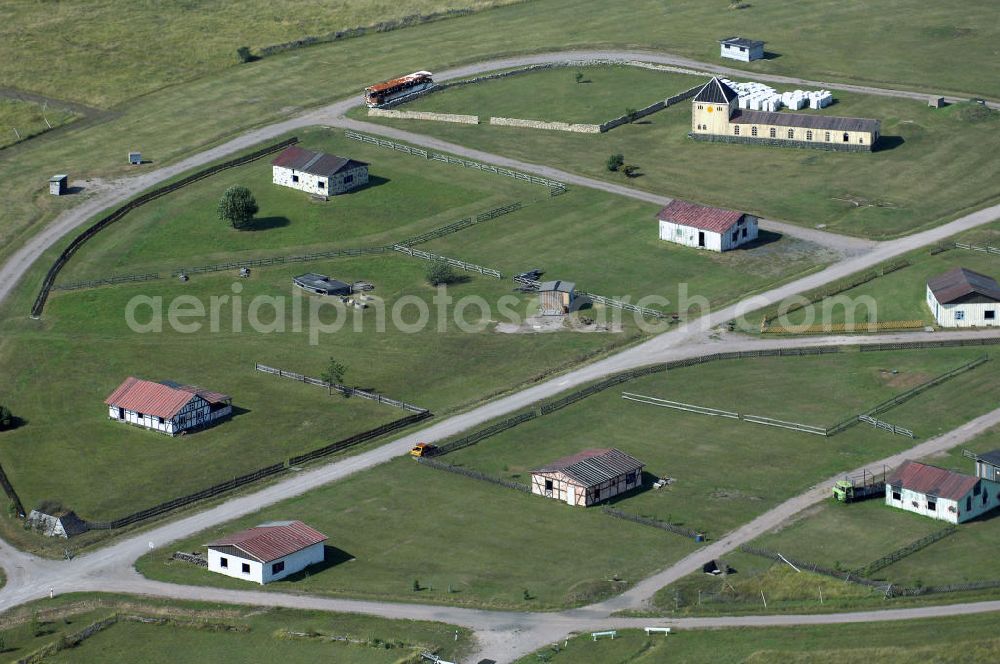 Aerial photograph OHRDRUF - Blick auf das Areal des Häuserkampfgeländes auf dem Truppenübungsplatz Ohrdruf der Bundeswehr.Am 5. April 1945 wurde der Truppenübungsplatz von der 4. US-Panzerdivision der 6. US-Armee erobert, sie richteten ein Durchgangslager für entlassene russische Kriegsgefangene ein. Während des Kalten Krieges wurde der Platz von 1947 bis 1991 durch die Gruppe der Sowjetischen Streitkräfte in Deutschland mit bis zu 25.000 Soldaten genutzt, zuletzt durch die 39. Garde Motorisierte-Schützen Division (8. Gardearmee - Nohra). Nach dem Abzug der sowjetischen Truppen wurde am 22. Dezember 1993 der Platz von der Bundeswehr übernommen.