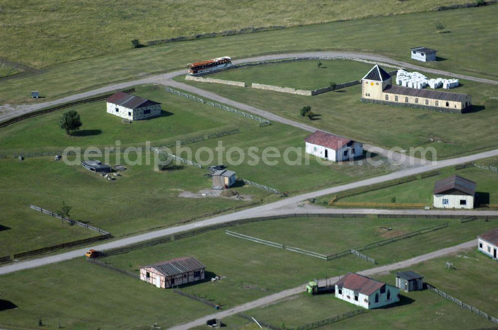 Aerial image OHRDRUF - Blick auf das Areal des Häuserkampfgeländes auf dem Truppenübungsplatz Ohrdruf der Bundeswehr.Am 5. April 1945 wurde der Truppenübungsplatz von der 4. US-Panzerdivision der 6. US-Armee erobert, sie richteten ein Durchgangslager für entlassene russische Kriegsgefangene ein. Während des Kalten Krieges wurde der Platz von 1947 bis 1991 durch die Gruppe der Sowjetischen Streitkräfte in Deutschland mit bis zu 25.000 Soldaten genutzt, zuletzt durch die 39. Garde Motorisierte-Schützen Division (8. Gardearmee - Nohra). Nach dem Abzug der sowjetischen Truppen wurde am 22. Dezember 1993 der Platz von der Bundeswehr übernommen.