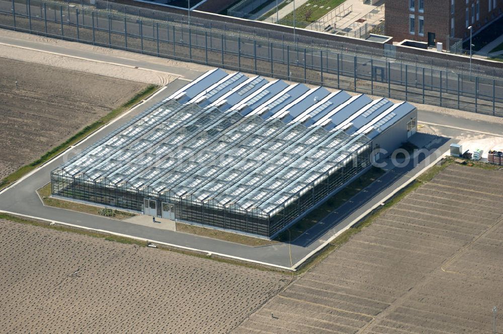 Aerial image Brandenburg - Blick auf das sich im Ausbau befindliche Areal der JVA Justizvollzugsanstalt Brandenburg. Erweiterungsbauflächen sind derzeit in der Planung und Erschließung. View of the expansion located in the grounds of the penitentiary Penitentiary Brandenburg. Expansion areas are currently in the planning and development.