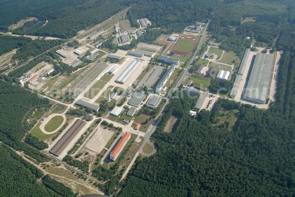 Doberlug-Kirchhain from the bird's eye view: Blick auf das Areal der Lausitzkaserne in Doberlug-Kirchhain. Die Kaserne wurde zu DDR- Zeiten von der Nationalen Volksarmee genutzt. Nach der Wendezeit war es als Lausitzkaserne Standort des Fallschirmjägerbataillons 373 der Bundeswehr, welches 2007 verlegt wurde. Die Anlagen werden seither wieder zu zivilen Zwecken genutzt.View of the Lausitz barracks. The barracks were used to GDR by the National People's Army. After the fall time, it was the site of the barracks as Lausitz Paratrooper Battalion 373 of the Federal Armed Forces, which was moved 2007th The plants have since been reused for civilian purposes.