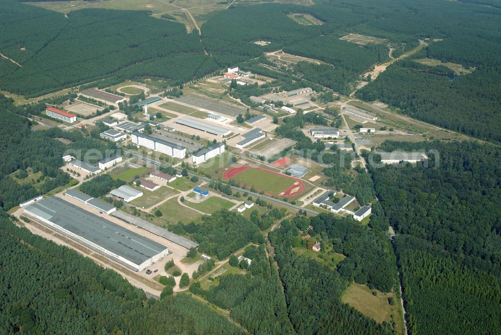 Aerial photograph Doberlug-Kirchhain - Blick auf das Areal der Lausitzkaserne in Doberlug-Kirchhain. Die Kaserne wurde zu DDR- Zeiten von der Nationalen Volksarmee genutzt. Nach der Wendezeit war es als Lausitzkaserne Standort des Fallschirmjägerbataillons 373 der Bundeswehr, welches 2007 verlegt wurde. Die Anlagen werden seither wieder zu zivilen Zwecken genutzt.View of the Lausitz barracks. The barracks were used to GDR by the National People's Army. After the fall time, it was the site of the barracks as Lausitz Paratrooper Battalion 373 of the Federal Armed Forces, which was moved 2007th The plants have since been reused for civilian purposes.