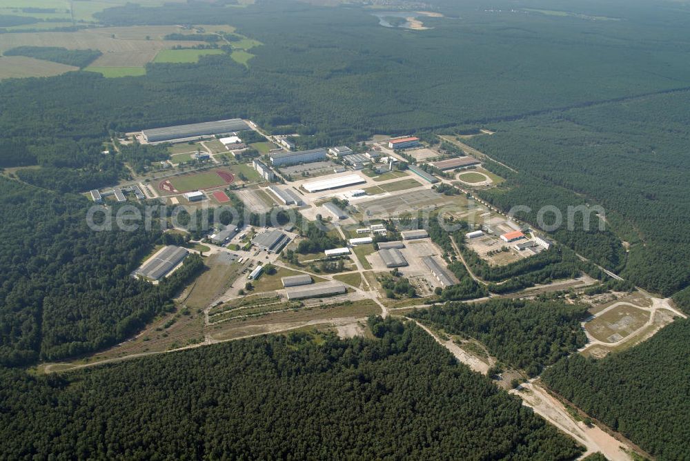 Doberlug-Kirchhain from the bird's eye view: Blick auf das Areal der Lausitzkaserne in Doberlug-Kirchhain. Die Kaserne wurde zu DDR- Zeiten von der Nationalen Volksarmee genutzt. Nach der Wendezeit war es als Lausitzkaserne Standort des Fallschirmjägerbataillons 373 der Bundeswehr, welches 2007 verlegt wurde. Die Anlagen werden seither wieder zu zivilen Zwecken genutzt.View of the Lausitz barracks. The barracks were used to GDR by the National People's Army. After the fall time, it was the site of the barracks as Lausitz Paratrooper Battalion 373 of the Federal Armed Forces, which was moved 2007th The plants have since been reused for civilian purposes.