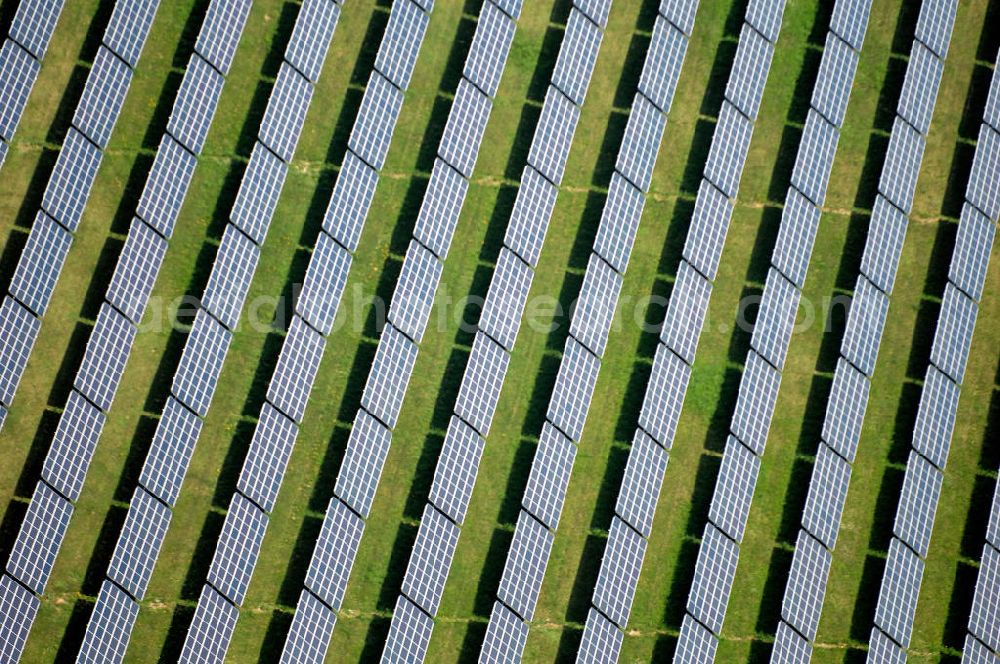 Aerial image Waldpolenz / Rote Jahne - Blick auf das Areal des neuen Solarparkes Rote Jahne, im Jahr 2007 speiste er bereits Strom im Wert von 2,1 Mio. Euro in das Stromnetz ein. Das ehemaligen Geländes des Flugplatz Eilenburg wurde in den 1930er Jahren gebaut. Zu DDR-Zeiten wurde er vom Ministerium für Staatssicherheit (MfS, Stasi) betrieben. Mit dem Anschluss an das Stromnetz hat die juwi solar GmbH aus Bolanden (Rheinland-Pfalz) nun den Bau des Solarprojektes Energiepark Waldpolenz im Landkreis Delitzsch nordöstlich??????????????????????????????????????????????????????????????????????????????????????????????????????????????????????????????????????????????????????????????????????????????????????????????????????????????????????????????????????????????????????????????????????????????????????????????????????????????????????????????????????????????????????????????????????????????????????