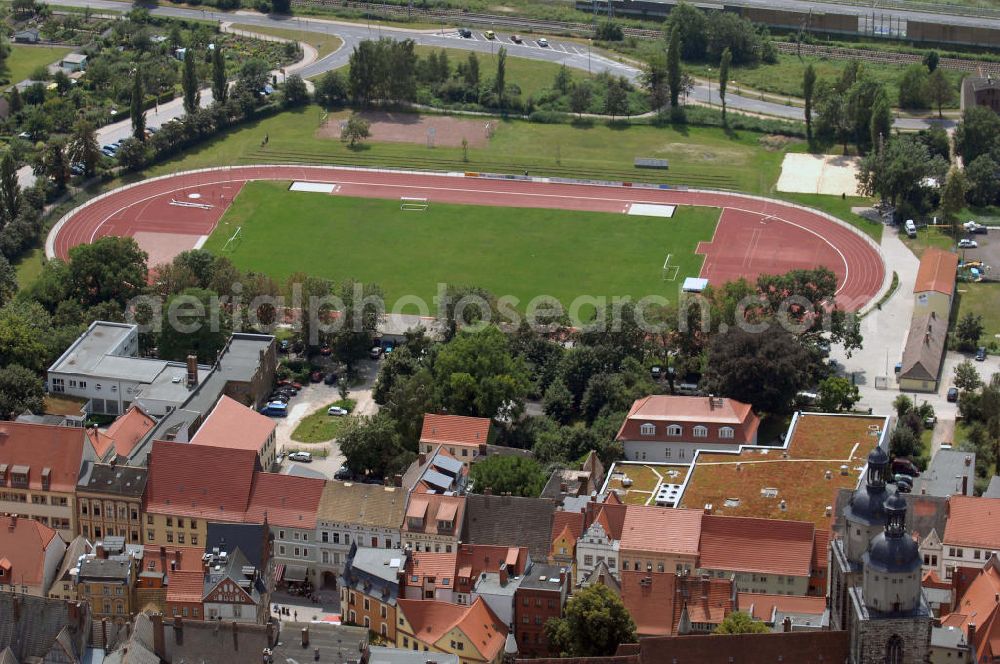 Lutherstadt Wittenberg from the bird's eye view: Blick auf das Arthur-Lambert-Stadion an der Wallstr. in Wittenberg. Verwaltet wird der Platz durch den TSG Wittenberg. Kontakt: Arthur-Lambert-Stadion, Wallstr. 20, 06886 Lutherstadt Wittenberg, Tel.: 03491403256. Kontakt: Tanzsportverein Schwarz-Gelb Wittenberg 1957 e.V., Am Schillerplatz 27, 06886 Lutherstadt Wittenberg, Tel.: 03491432590.