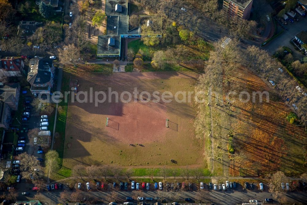 Oberhausen from the bird's eye view: Ash- football pitch on Sedanstrasse and John Lennon Square in Oberhausen in the state of North Rhine-Westphalia