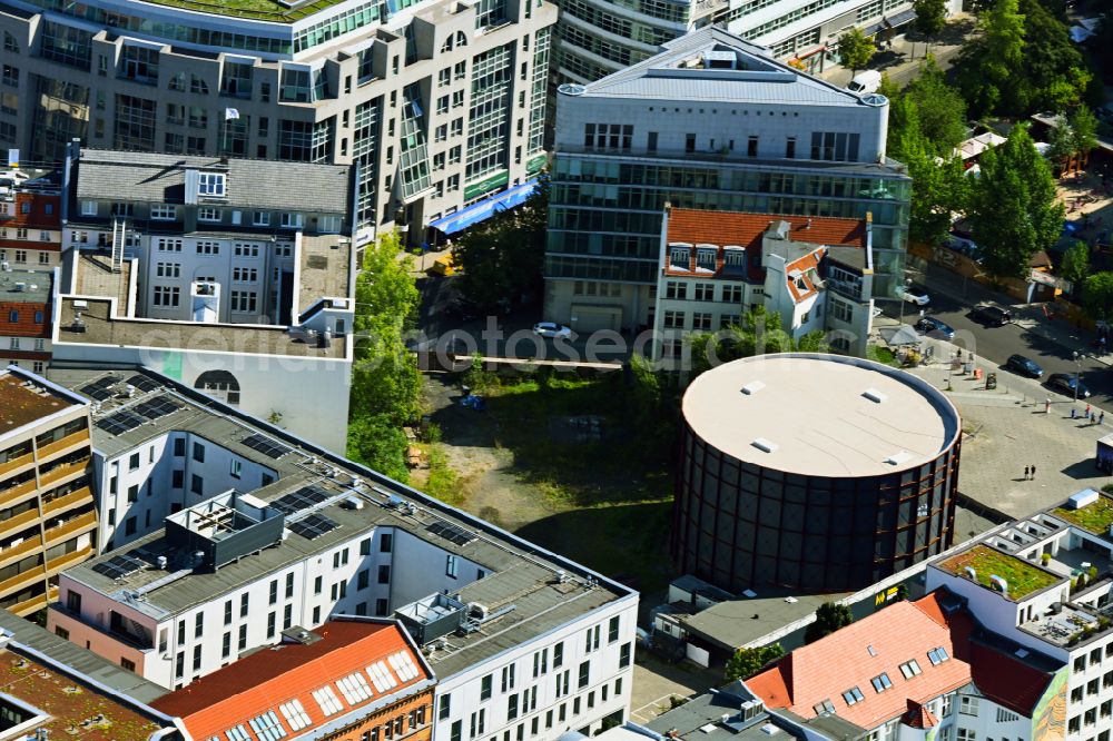 Berlin from the bird's eye view: View at the construction site of the new building Asisi-Panometer at the Friedrichstrasse in the district Mitte in Berlin. The Panometer is a project of the artist Yadegar Asisi and shows a panoramic view through an compressed artistic look at his panoramic image The Wall about the divided Berlin during the Cold War