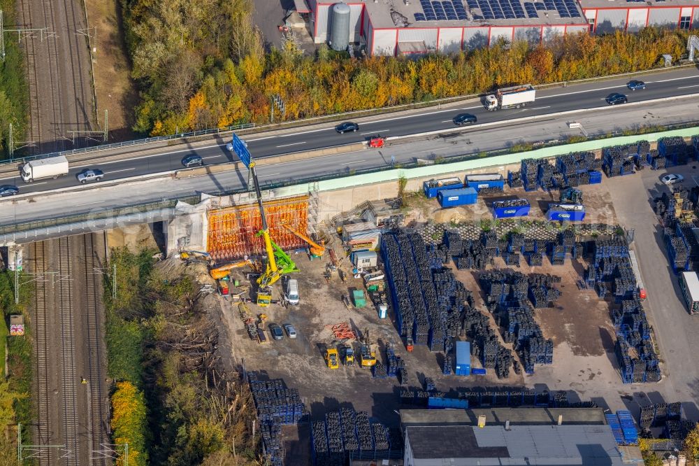 Witten from the bird's eye view: Motorway construction site to renew the asphalt surface on the route of the A40 with repair work after a major fire of the local tire store in the district Hamme in Witten at Ruhrgebiet in the state North Rhine-Westphalia, Germany