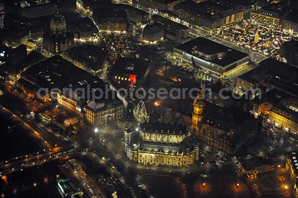 Aerial image at night Dresden - Nachtaufnahme der weihnachtlich geschmückten Altstadt mit Blick Richtung Südosten. Im Vordergrund die Katholische Hofkirche und das Residenzschloss am Theaterplatz. Night shot of the festively decorated old town,viewing direction southeast.