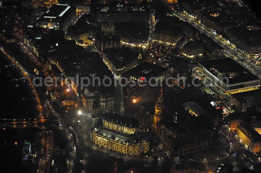 Dresden at night from above - Nachtaufnahme der weihnachtlich geschmückten Altstadt mit Blick Richtung Südosten. Im Vordergrund die Katholische Hofkirche und das Residenzschloss am Theaterplatz. Night shot of the festively decorated old town,viewing direction southeast.