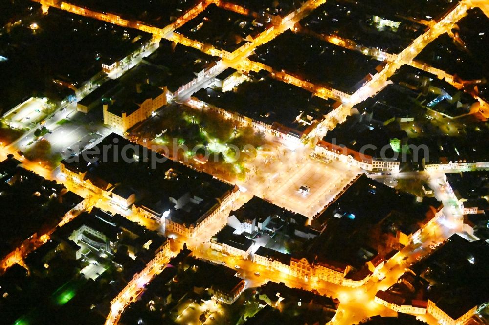 Aerial image at night Bernburg (Saale) - Night lighting old Town area and city center on Karlsplatz in Bernburg (Saale) in the state Saxony-Anhalt, Germany