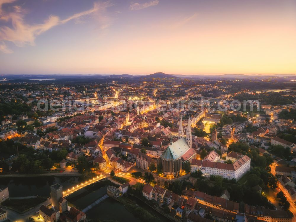 Aerial photograph at night Görlitz - Night lighting old Town area and city center on the banks of the Neisse in Goerlitz in the state Saxony, Germany