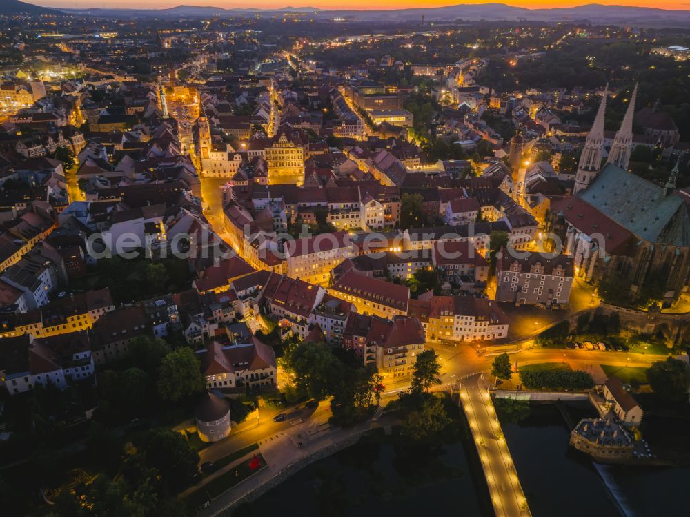 Aerial image at night Görlitz - Night lighting old Town area and city center on the banks of the Neisse in Goerlitz in the state Saxony, Germany