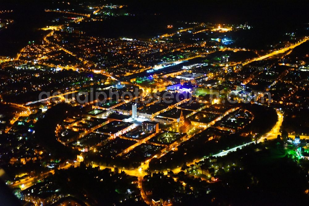 Aerial image at night Neubrandenburg - Night lighting Old Town area and city center in Neubrandenburg in the state Mecklenburg - Western Pomerania, Germany