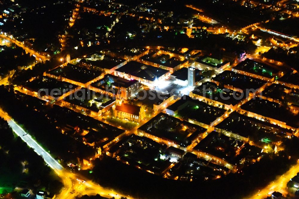 Aerial photograph at night Neubrandenburg - Night lighting Old Town area and city center in Neubrandenburg in the state Mecklenburg - Western Pomerania, Germany