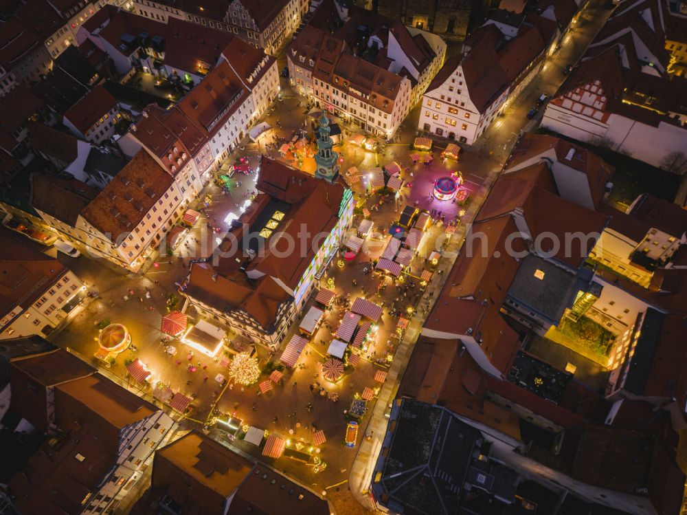 Aerial photograph at night Pirna - Night lights and illumination Christmas market Canalettomarkt in the old town area and city center in Pirna in the federal state of Saxony, Germany