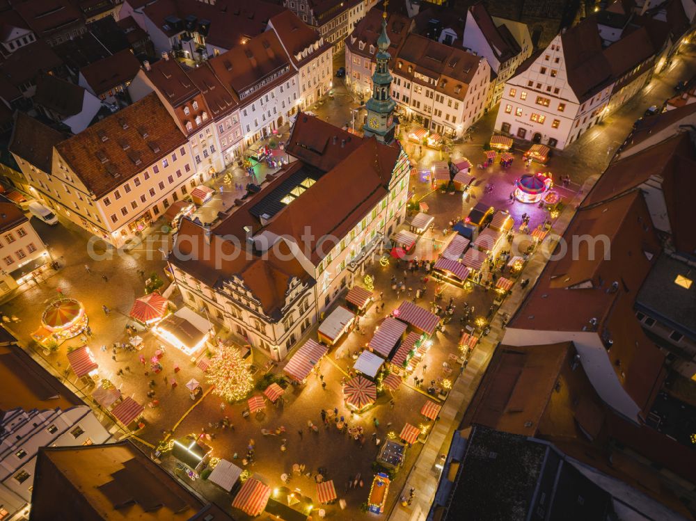 Aerial photograph at night Pirna - Night lights and illumination Christmas market Canalettomarkt in the old town area and city center in Pirna in the federal state of Saxony, Germany