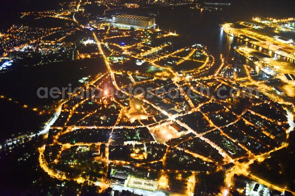 Wismar at night from the bird perspective: Night lighting Old Town area and city center in Wismar in the state Mecklenburg - Western Pomerania, Germany