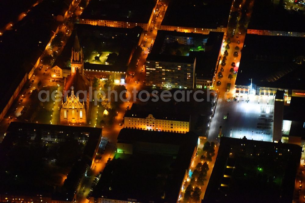 Aerial image at night Neubrandenburg - Night lighting Old Town area and city center on Marktplatz in Neubrandenburg in the state Mecklenburg - Western Pomerania, Germany