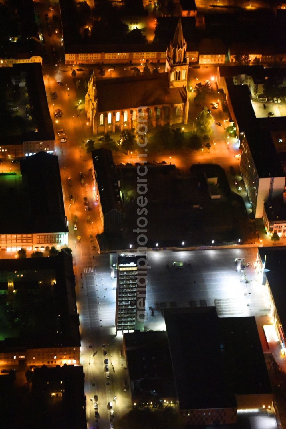 Neubrandenburg at night from the bird perspective: Night lighting Old Town area and city center on Marktplatz in Neubrandenburg in the state Mecklenburg - Western Pomerania, Germany