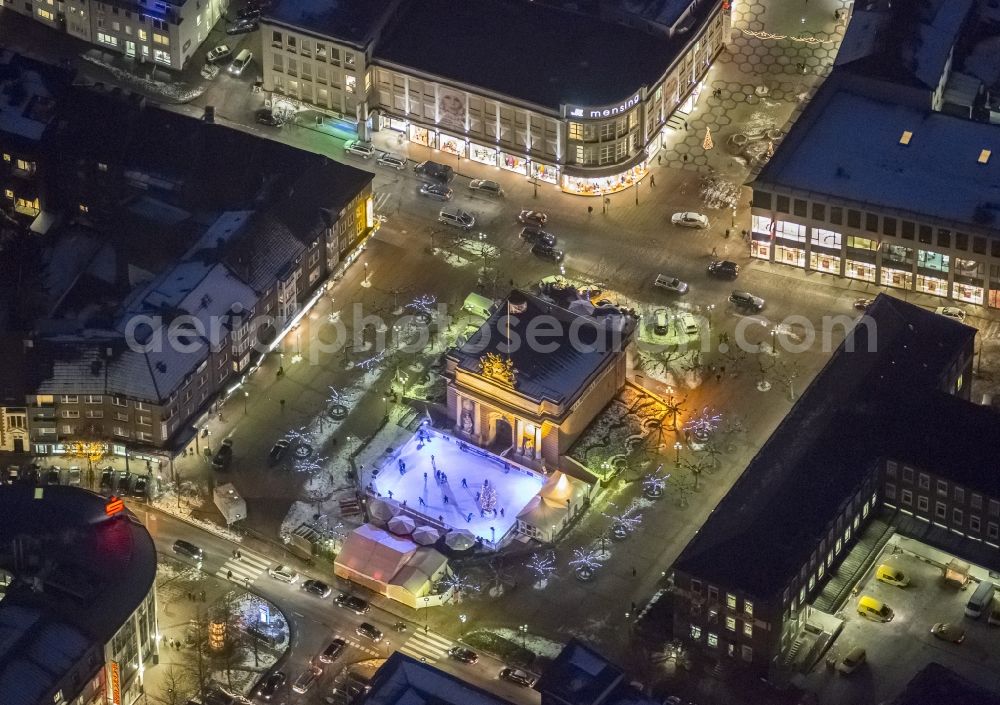 Wesel at night from the bird perspective: Night aerial photograph of the area at the Berliner-Tor-Platz in Wesel, in North Rhine-Westphalia