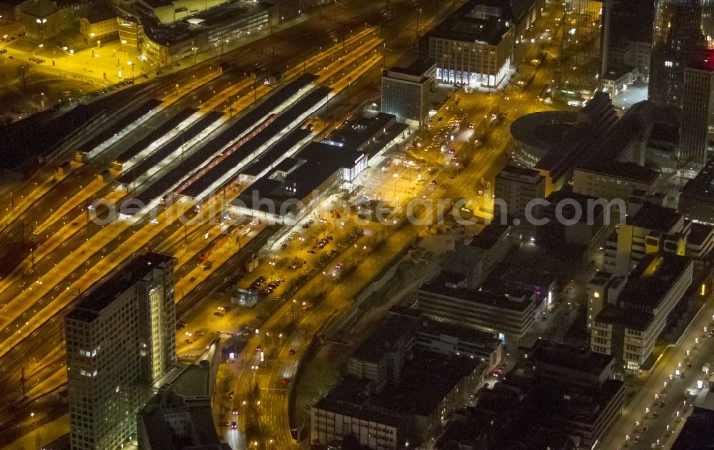 Aerial photograph at night Dortmund - Night aerial photography of the city center - the center at Dortmund's central station. The picture shows the area at the King Wall, Station Road and the residential and commercial buildings in the city and the Library of Dortmund