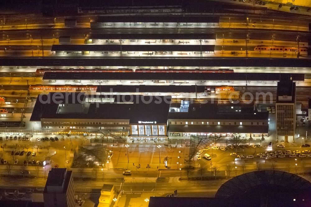 Dortmund at night from above - Night aerial photography of the city center - the center at Dortmund's central station. The picture shows the area at the King Wall, Station Road and the residential and commercial buildings in the city and the Library of Dortmund