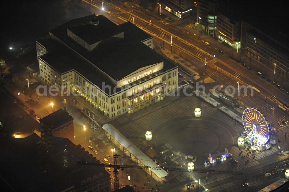 Leipzig at night from the bird perspective: Nachtaufnahme des Augustusplatzes vor der Oper mit dem Weihnachtsrad. Night shot of Augustusplatz in front of the opera with the Christmas Wheel.