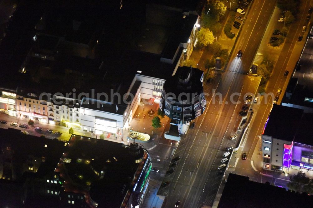 Berlin at night from the bird perspective: Night view lookout tower Bierpinsel at the Joachim Tiburtius Bridge in the Schlossstrasse in Berlin-Steglitz. Architects of the Bierpinsel are Ralf Schueler und Ursulina Schueler-Witte