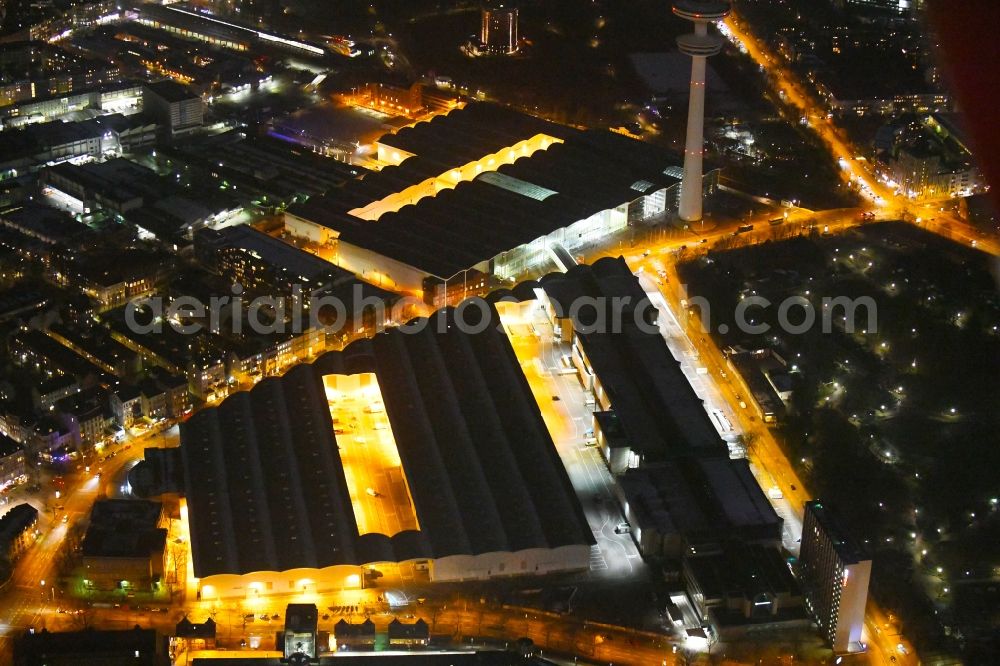 Hamburg at night from above - Night lighting exhibition grounds and exhibition halls of the Honburg Messe and Congress GmbH on Messeplatz in the district Sankt Pauli in Hamburg, Germany