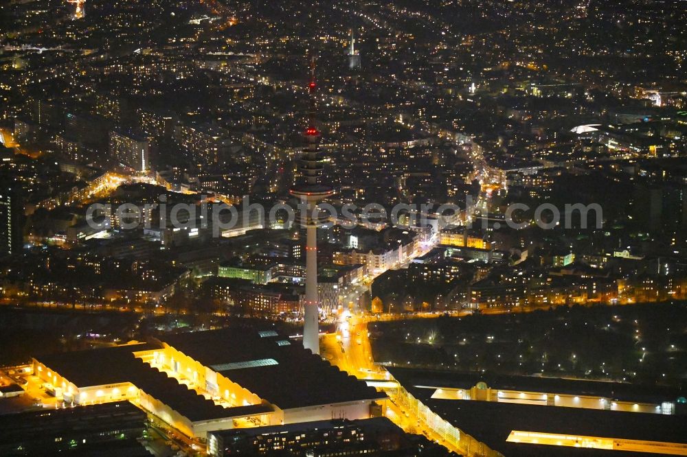 Hamburg at night from above - Night lighting exhibition grounds and exhibition halls of the Honburg Messe and Congress GmbH on Messeplatz in the district Sankt Pauli in Hamburg, Germany