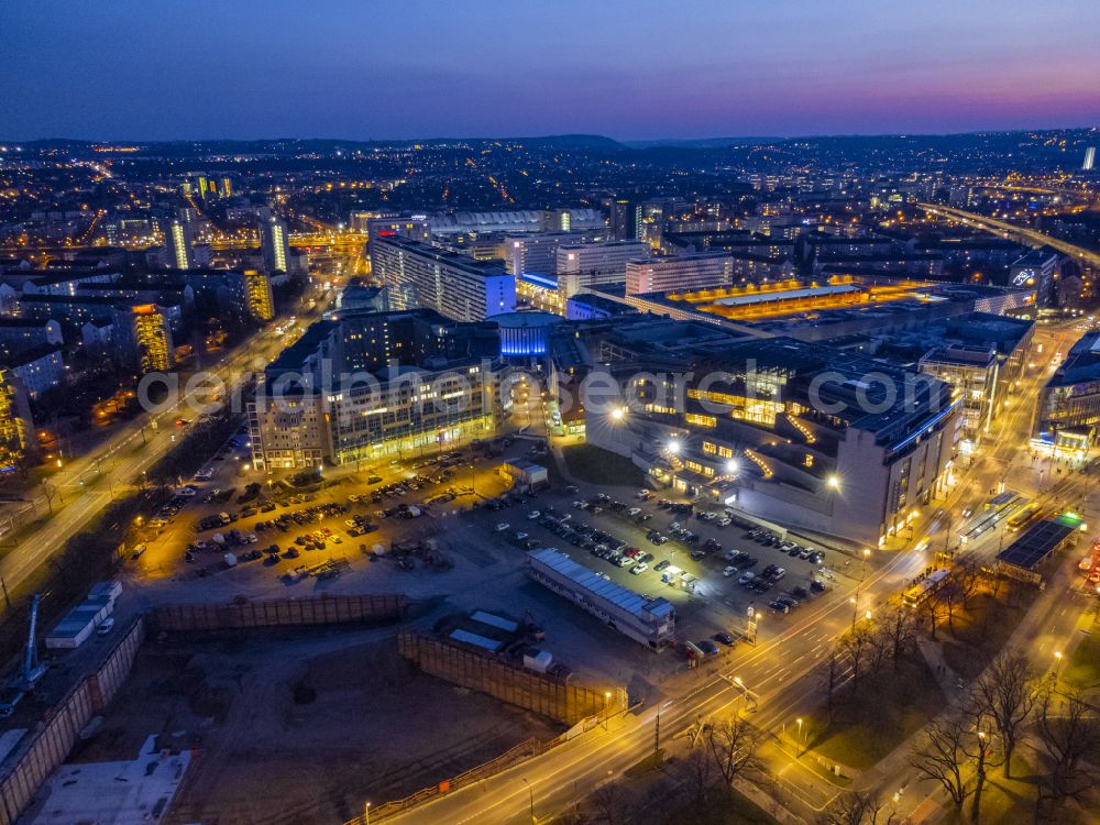 Dresden at night from the bird perspective: Night lighting parking and storage space for automobiles on place Ferdinandplatz in Dresden in the state Saxony, Germany