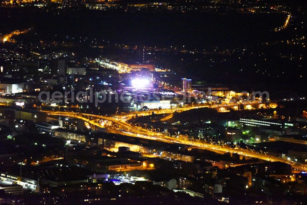 Aerial photograph at night Berlin - Night view routing and traffic lanes during the highway exit and access the motorway A 100 - 113 Grenzallee destrict Neukoelln in Berlin