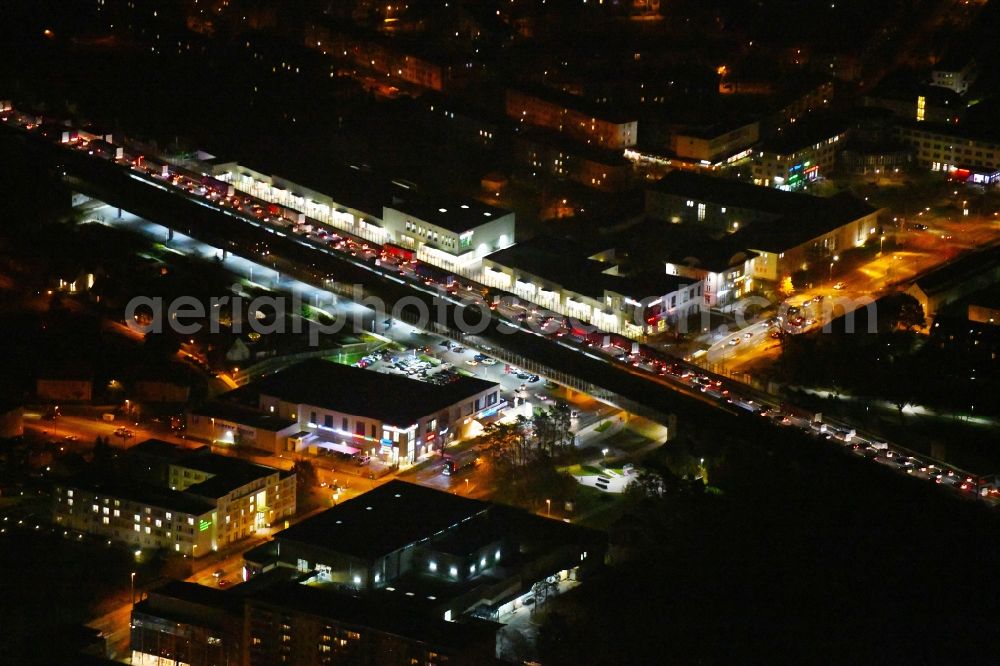 Aerial image at night Ludwigsfelde - Night lighting Lanes of the motorway- route and course of the A10 in Ludwigsfelde in the state Brandenburg, Germany