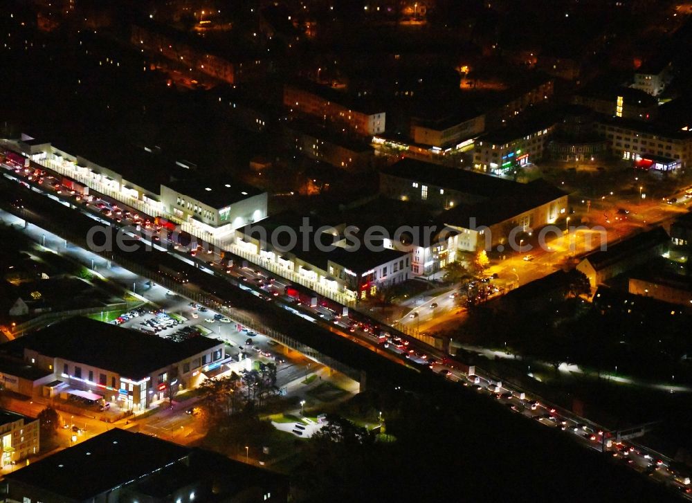 Ludwigsfelde at night from above - Night lighting Lanes of the motorway- route and course of the A10 in Ludwigsfelde in the state Brandenburg, Germany