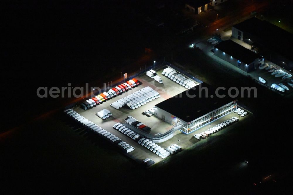 Aerial photograph at night Siek - Night lighting car dealership building ACR GmbH in Siek in the state Schleswig-Holstein, Germany