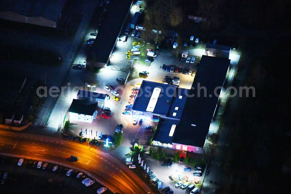 Strausberg at night from above - Night lighting Car dealership building Mueller GmbH & Co. KG in Strausberg in the state Brandenburg, Germany