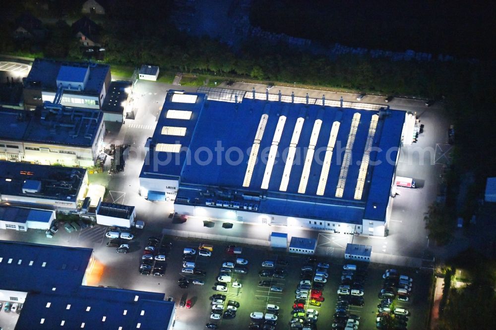 Aerial photograph at night Berlin - Night lighting car dealership building of Volkswagen Automobile Berlin GmbH on Goerzallee in the district Lichterfelde in Berlin, Germany