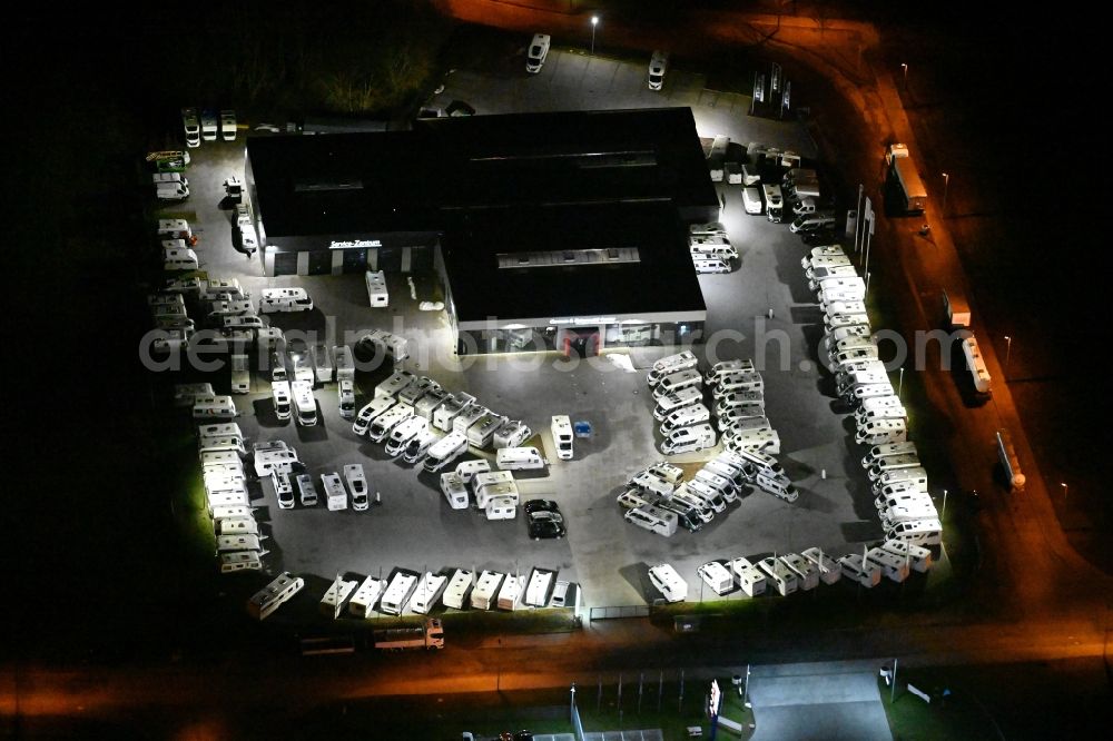 Aerial photograph at night Wesenberg - Night lighting car dealership building for RVs Caravan & Reisemobil Center Reinfeld GmbH & Co. KG on Stubbendorfer Ring in the district Stubbendorf in Wesenberg in the state Schleswig-Holstein, Germany