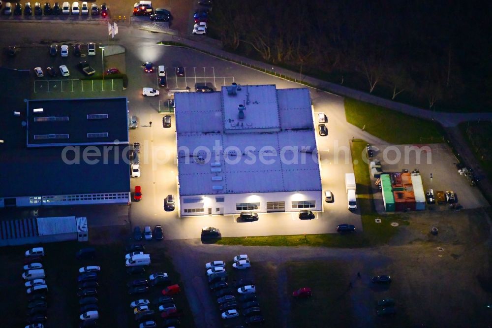 Bernau at night from above - Night lighting car dealership building Zemke Autohaus Bernau in Bernau in the state Brandenburg, Germany