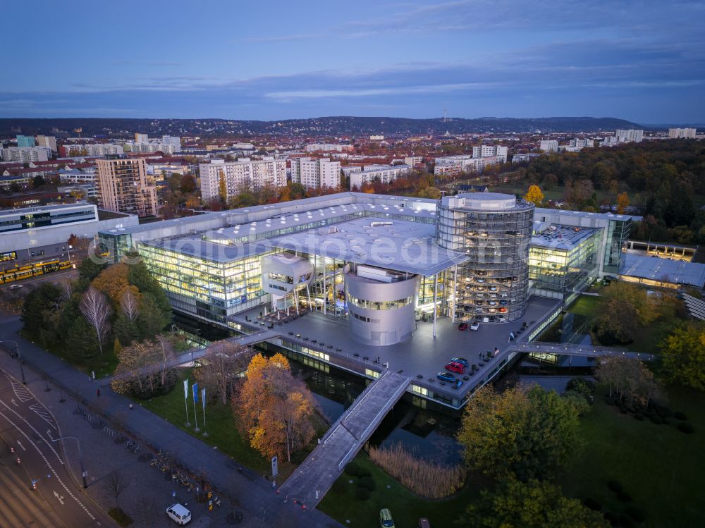 Dresden at night from above - Night lighting car dealership building Glaeserne Manufaktur on street Lennestrasse in Dresden in the state Saxony, Germany