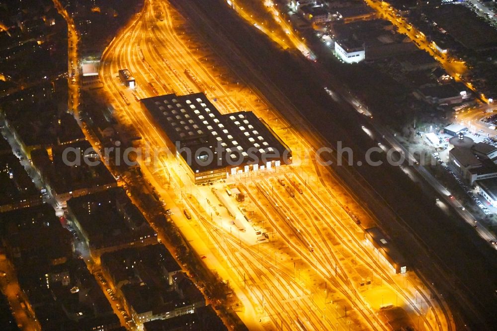 Nürnberg at night from above - Night lighting Railway depot and repair shop for maintenance and repair of trains of passenger transport on Austrasse in the district Baerenschanze in Nuremberg in the state Bavaria, Germany