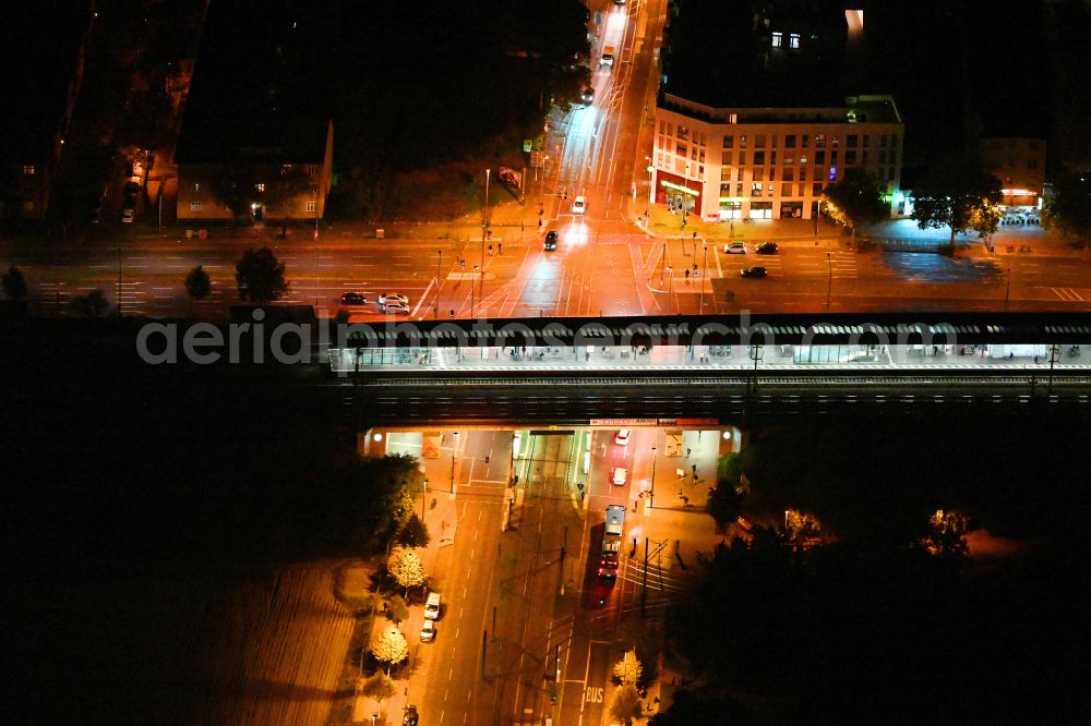 Berlin at night from above - Night lighting station building and track systems of the S-Bahn station Adlershof on street Rudower Chaussee in the district Adlershof in Berlin, Germany