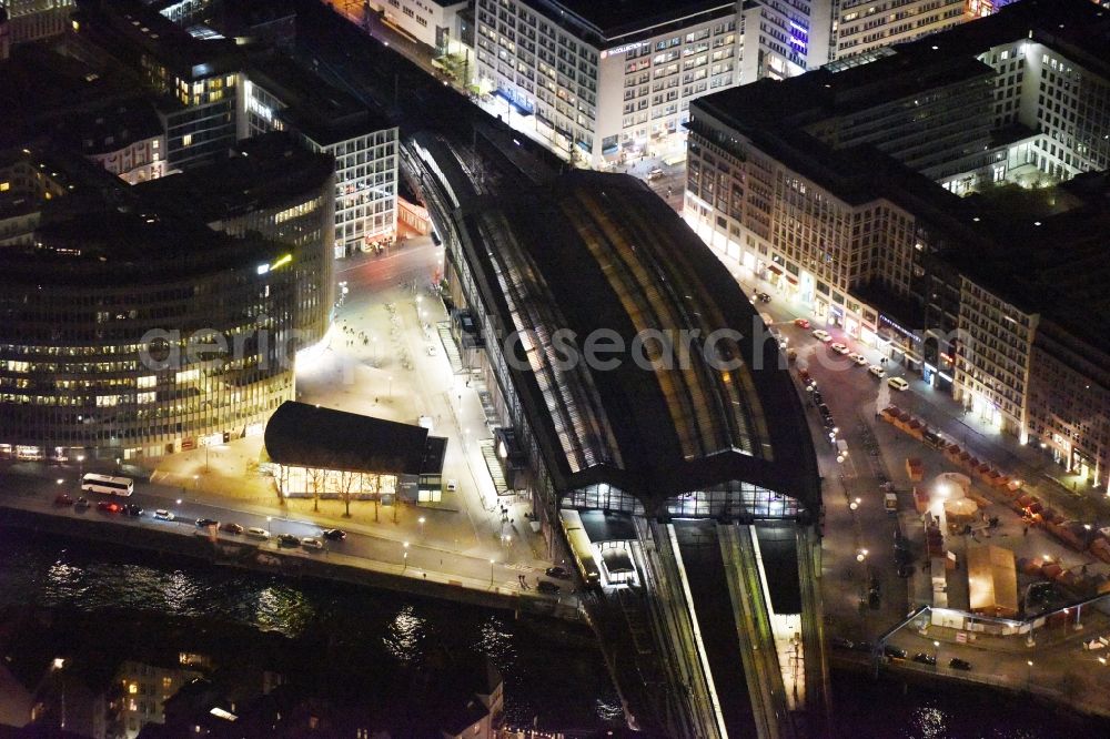 Berlin at night from above - Night view station building and track systems of the S-Bahn station Friedrichstrasse in Berlin