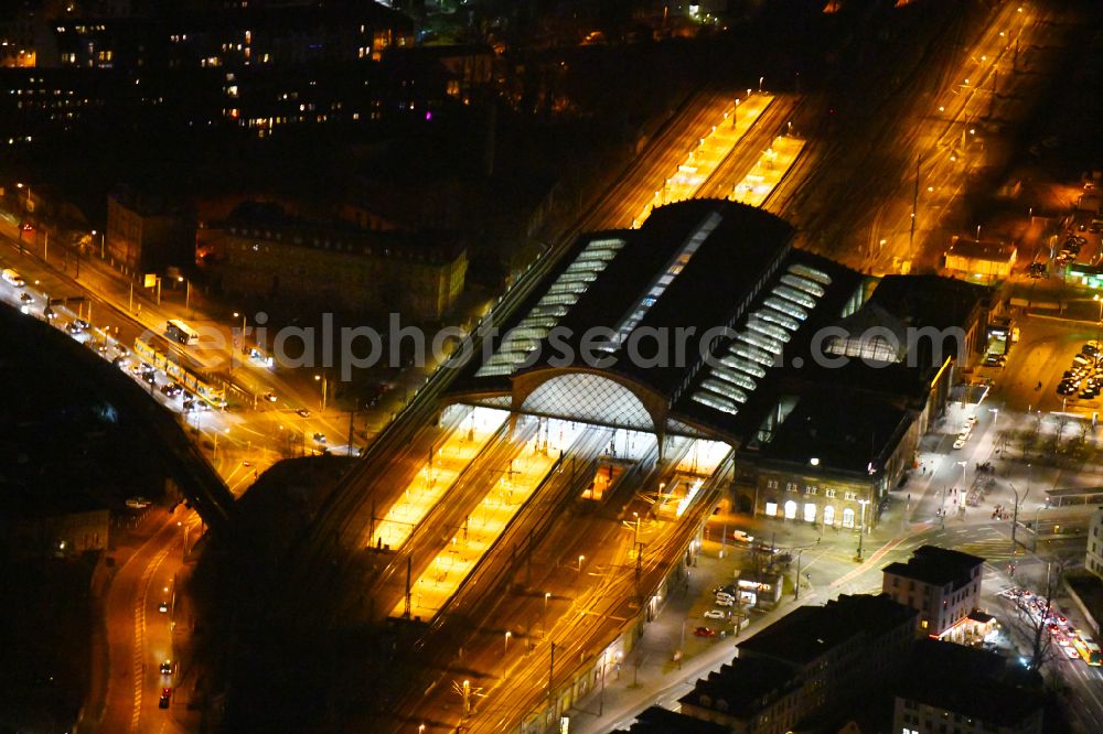 Dresden at night from above - Night lighting station building and track systems of the S-Bahn station Dresden-Neustadt on place Schlesischer Platz in the district Neustadt in Dresden in the state Saxony, Germany