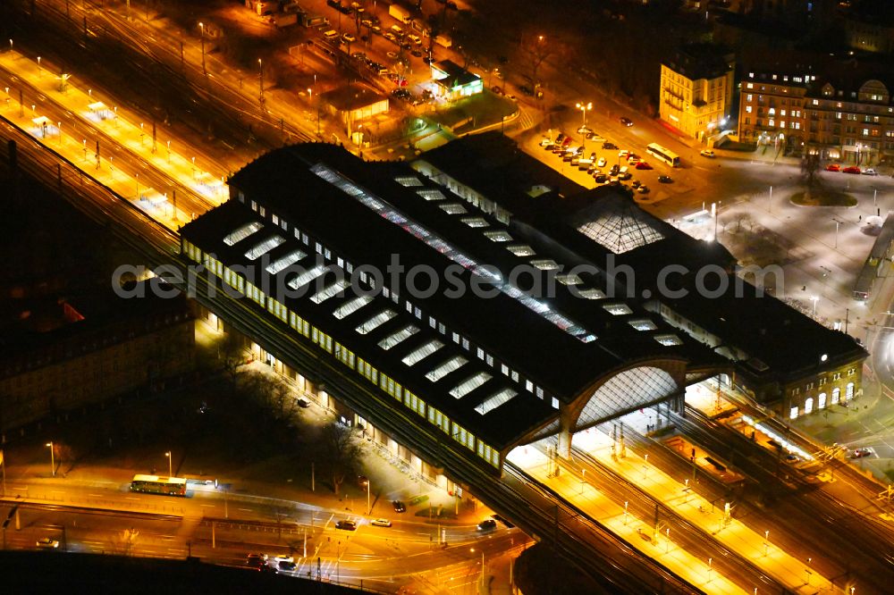 Dresden at night from above - Night lighting station building and track systems of the S-Bahn station Dresden-Neustadt on place Schlesischer Platz in the district Neustadt in Dresden in the state Saxony, Germany