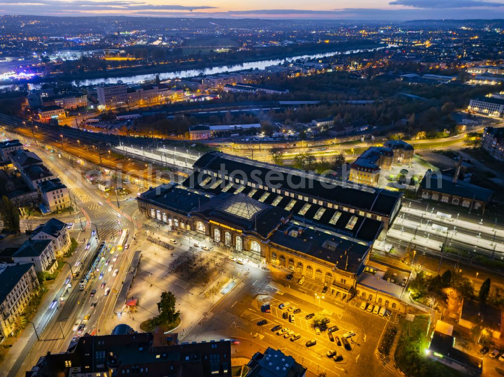 Aerial image at night Dresden - Night lighting station building and track systems of the S-Bahn station Dresden-Neustadt on place Schlesischer Platz in the district Neustadt in Dresden in the state Saxony, Germany